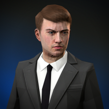 An angry-looking Russian man wearing a suit.